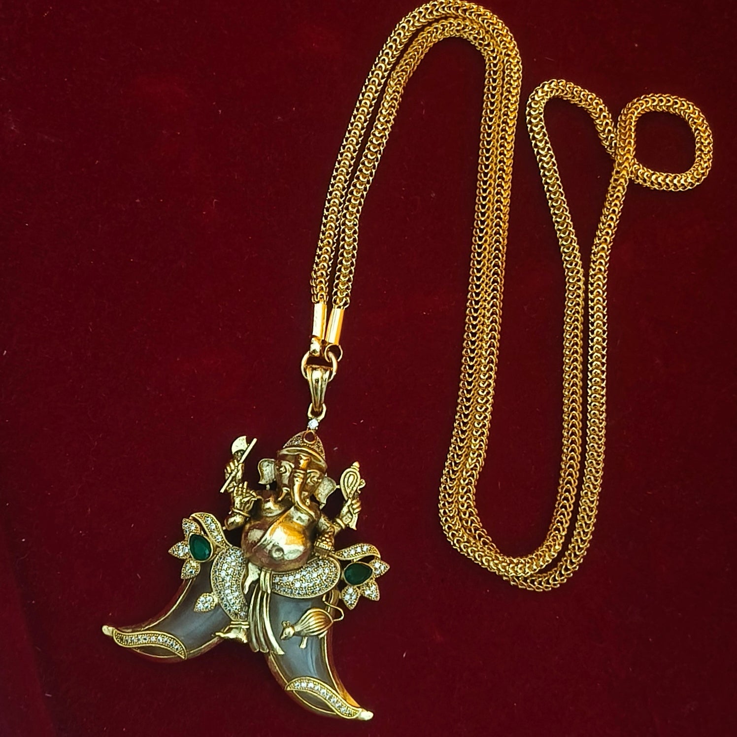 Handcrafted Lord Ganesha Double Tiger-Claw Pendant DL- 21023