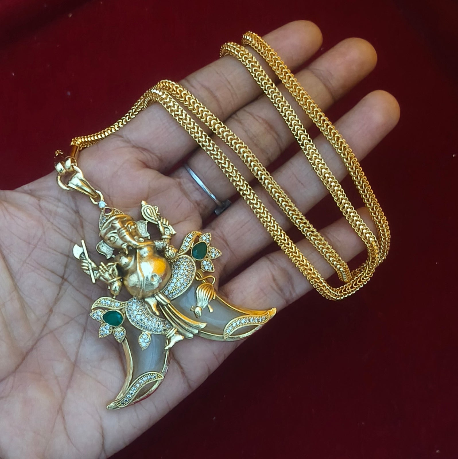 Handcrafted Lord Ganesha Double Tiger-Claw Pendant DL- 21023