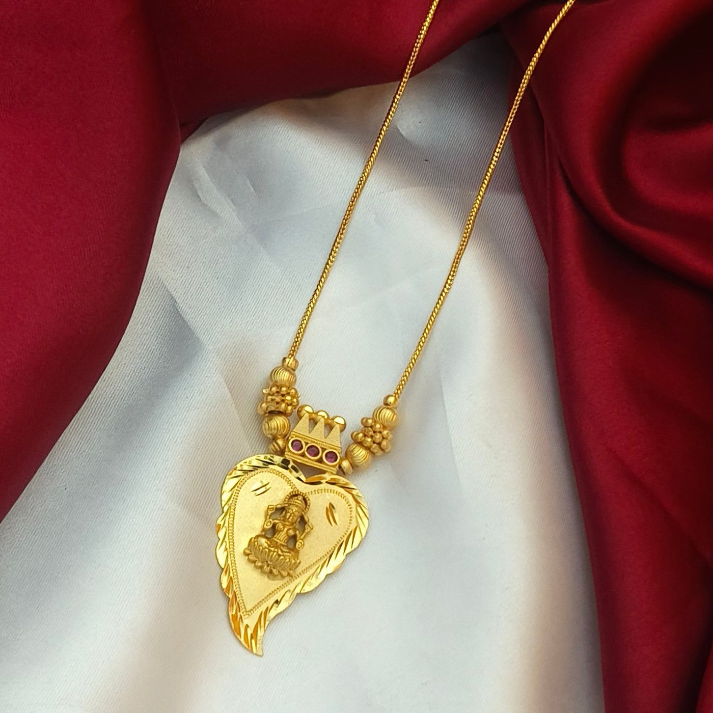 Gold-Plated Lakshmi Heart Necklace with Ruby Accents DL-21029