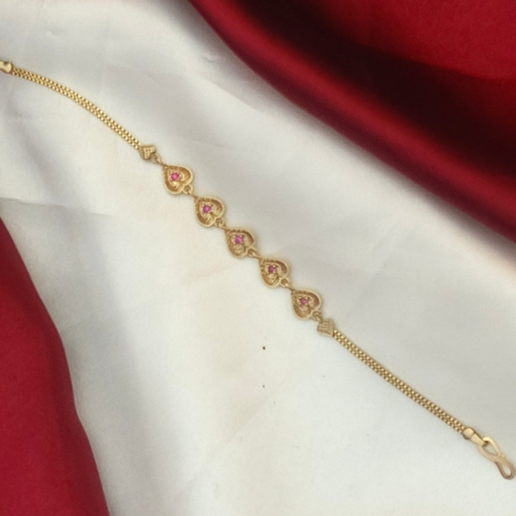 Pure impon heart pattern ruby toned bracelet BR- 51020
